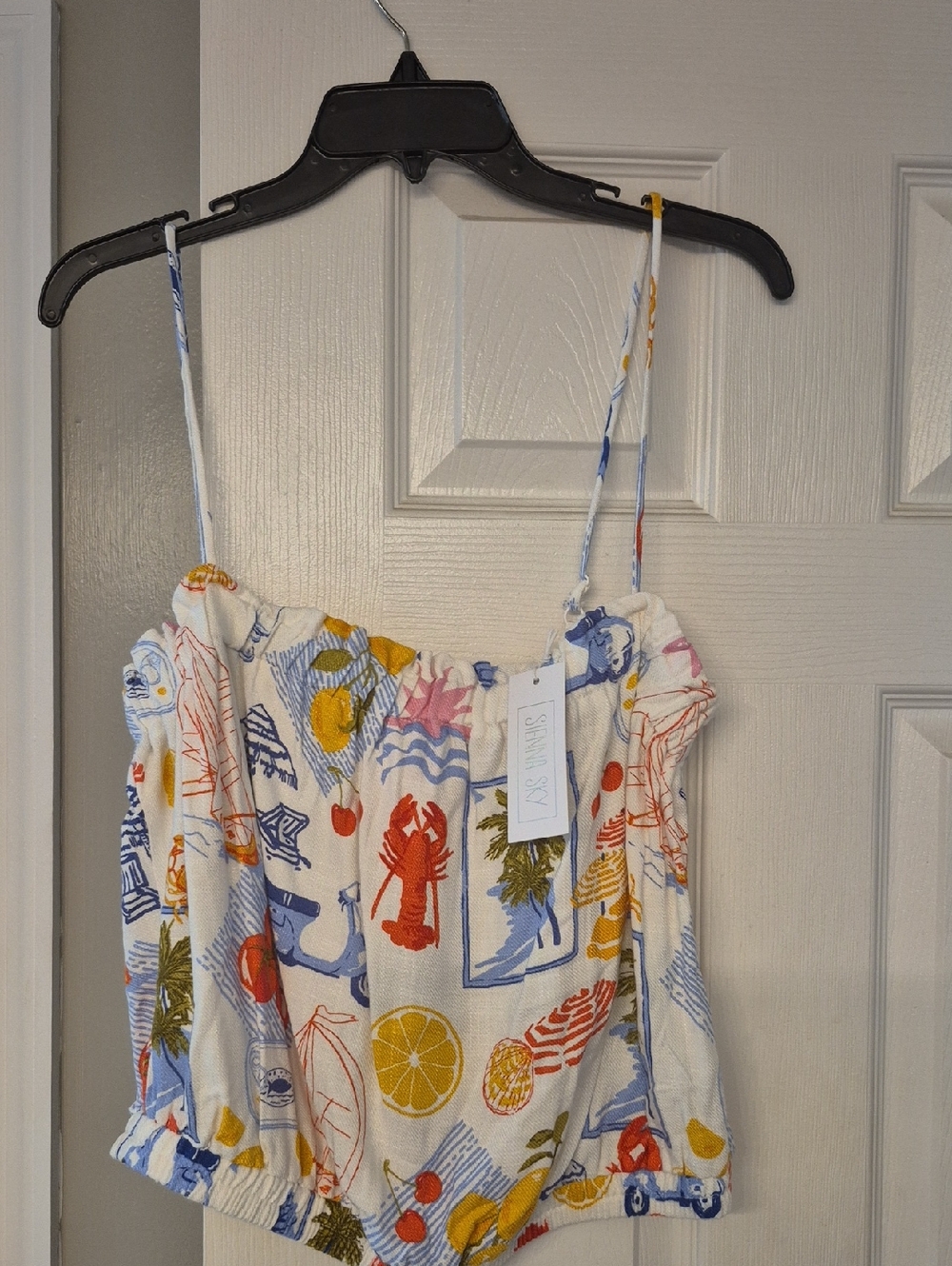 Sienna Sky Cream Tank Top with Red, Blue, Yellow and Green Tropical Print